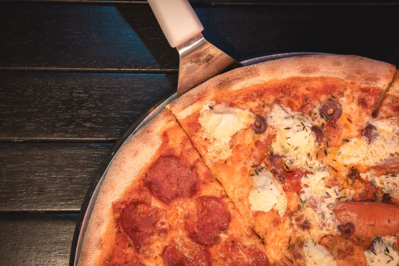 Four cheese deep dish pizza with premium cheese blend