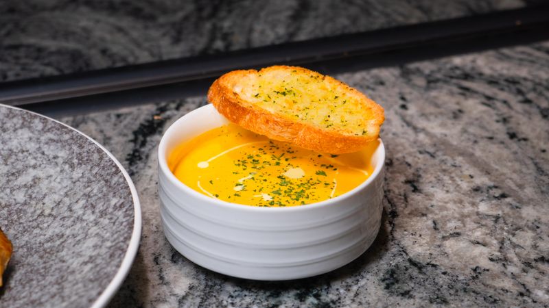 Garlic bread with herb butter and parmesan