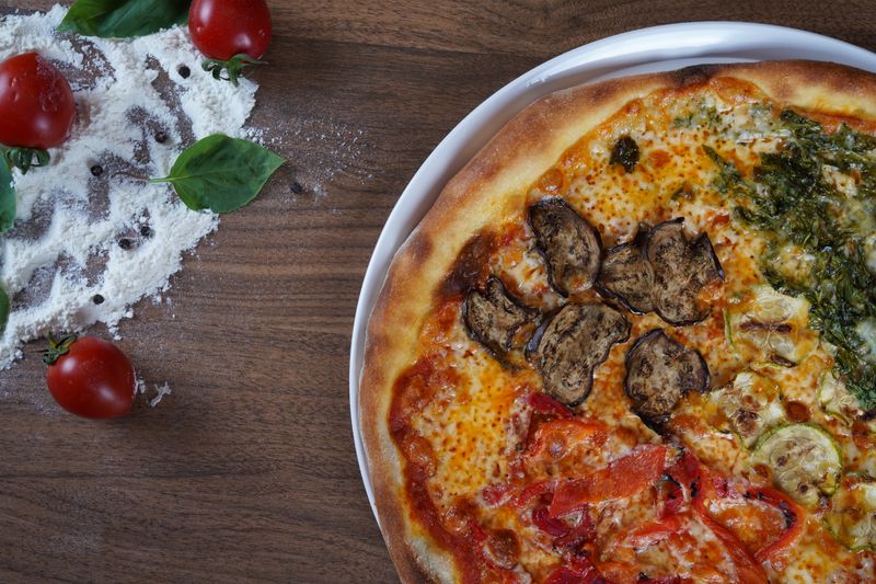 Vegetarian deep dish pizza loaded with fresh vegetables