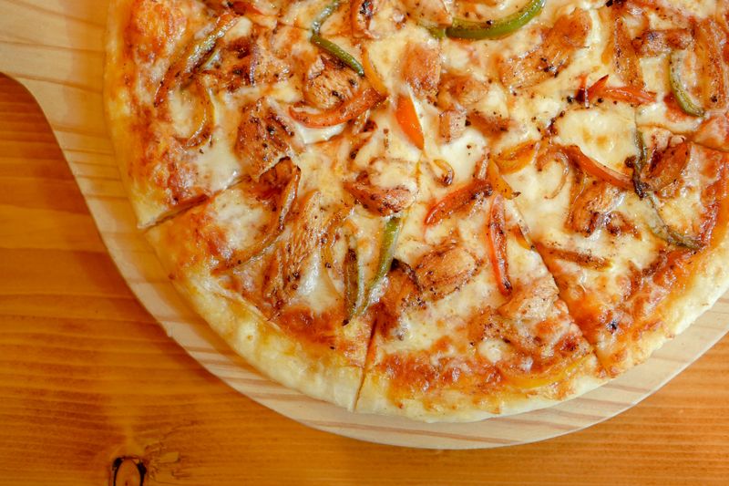 BBQ chicken deep dish pizza with smoky sauce